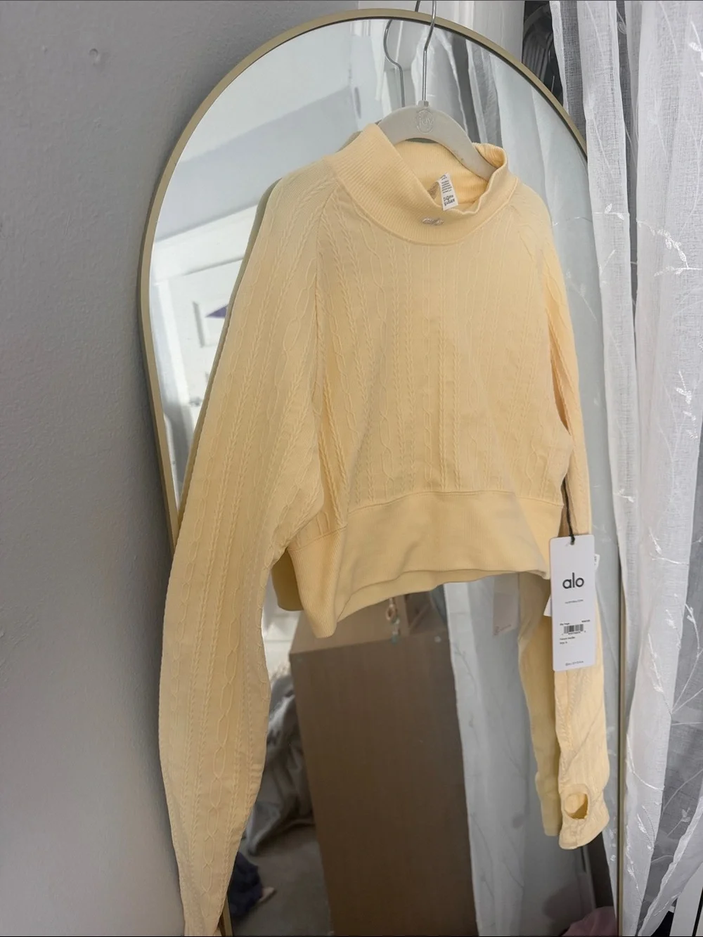 ALO Yoga Ribbed High-Neck Cropped Long-Sleeve Top in Cream
